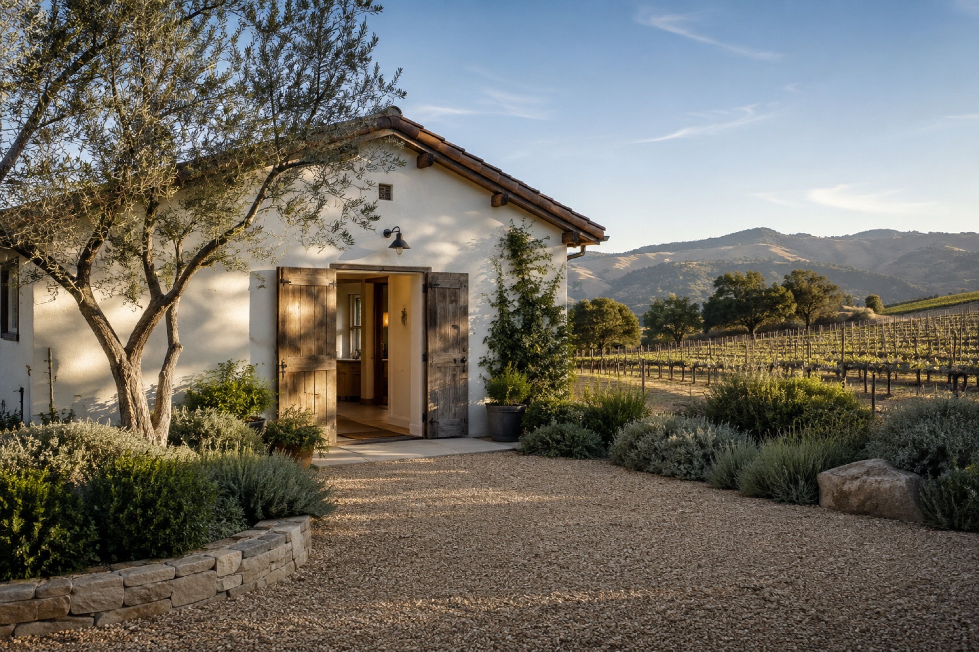 A prepared wine-country cottage beside a vineyard